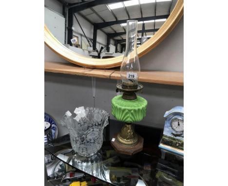 A Victorian oil lamp (shade a/f).