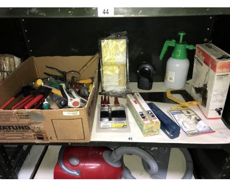 A box of assorted tools including soldering iron.