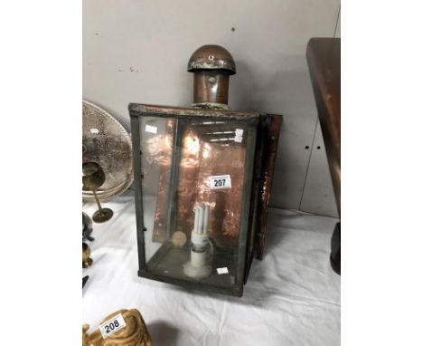 A Victorian copper wall mounted street lamp.