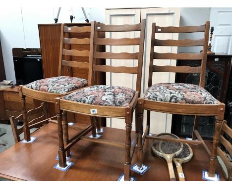 5 ladder back chairs.