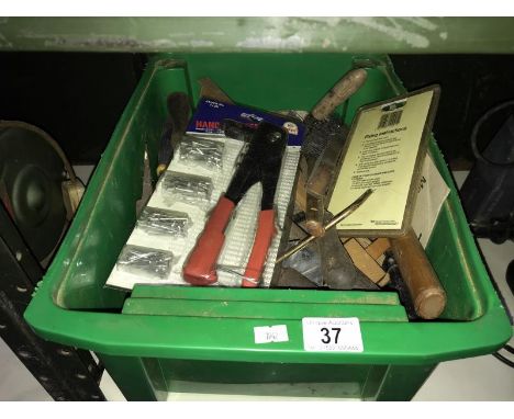 A box of assorted tools
