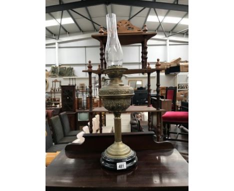 An old brass oil lamp.