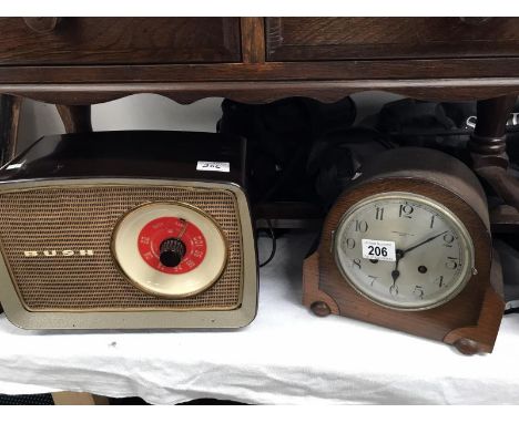 A Bush Radio and a Barron Clark &amp; Son mantel clock.