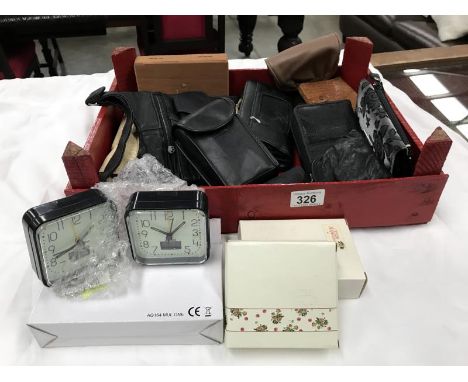 A mixed lot including purses, travel clocks, camera etc.,