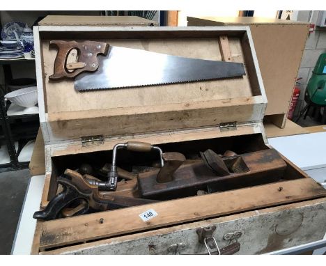 A vintage case of carpenter's tools including saws, planes etc.,