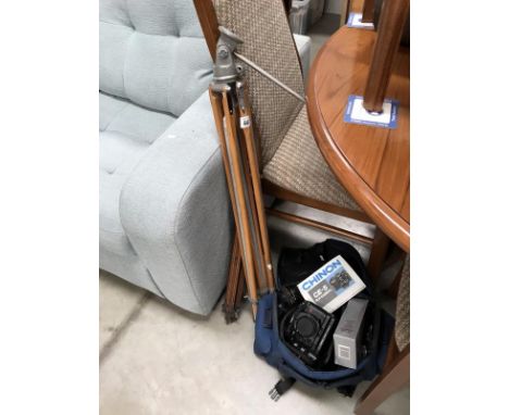 A cased camera, tripods etc.,