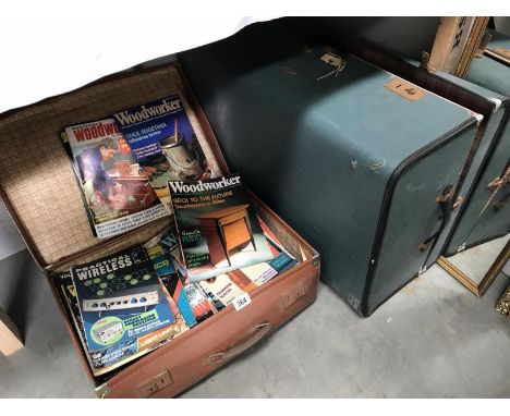A case of woodworking magazines and a vintage case.