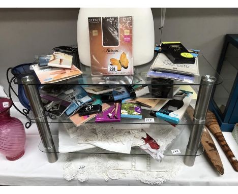 A good lot of vintage tights and stockings together with a quantity of linen.