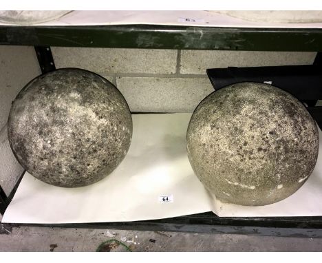 2 large circular garden gate post tops.