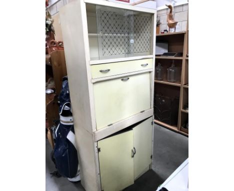 A vintage kitchen cabinet.