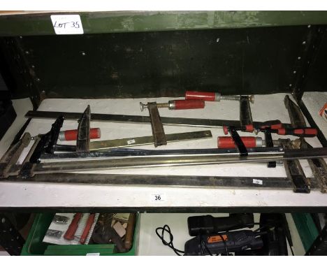 A quantity of various size sash clamps