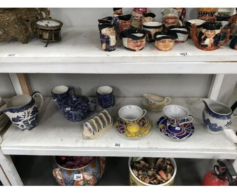 A Shelf of china including Rington's 3 piece tea set, Leonardo deco style tea cups and saucers etc.,