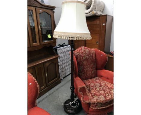 A standard lamp with shade.