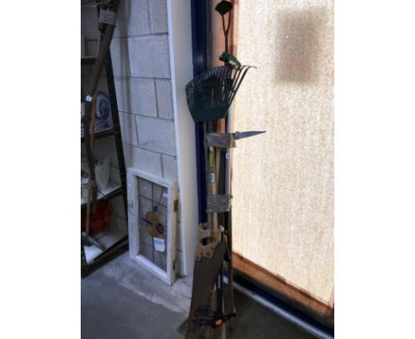 A quantity of mainly garden tools.