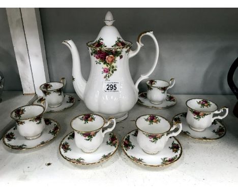 A Royal Albert Old Country Roses coffee pot together with 6 coffee cups and saucers.