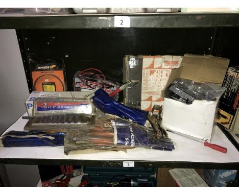 A shelf of socket sets, spanners &amp; outdoor light etc.