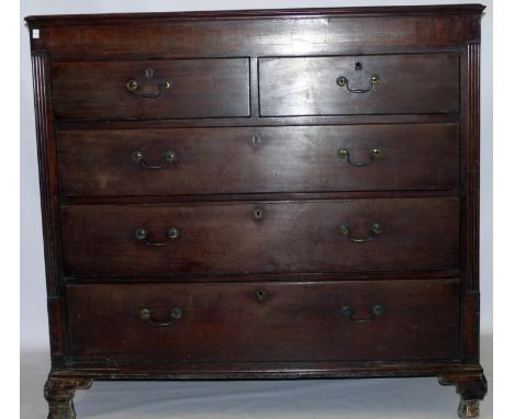 A George III inlaid mahogany chest of drawers of generous proportions
The moulded rectangular top above two short and three l