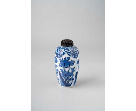 A SMALL CHINESE BLUE AND WHITE 'FLOWERS' VASEKANGXI 1662-1722The ovoid body painted with four panels containing prunus, peony