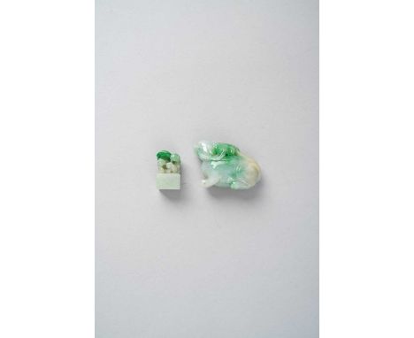 A CHINESE JADEITE CARVING OF A LION DOG AND A SMALL JADEITE UNCUT SEALQING DYNASTY OR LATERThe crouching beast looking slight