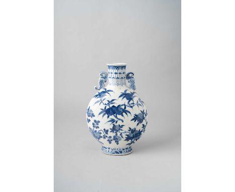 A CHINESE BLUE AND WHITE PEACH AND POMEGRANATE MOONFLASK, BIANHU19TH CENTURYThe body painted with fruiting leafy sprays of pe