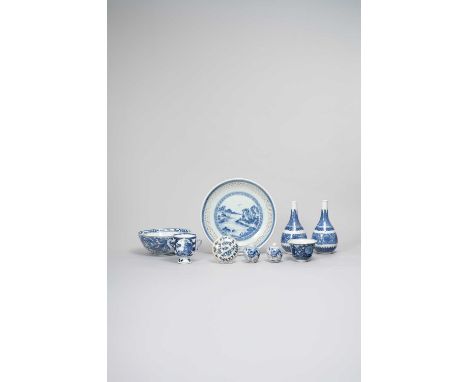 NINE CHINESE BLUE AND WHITE ITEMSQING DYNASTYComprising: a reticulated dish with a landscape scene; a bowl decorated with dra