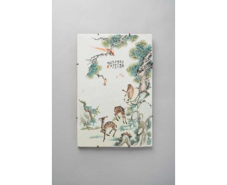 A CHINESE ENAMELLED PORCELAIN PANEL REPUBLIC PERIODDepicting two deer, a monkey and a red cardinal bird in a rocky landscape 