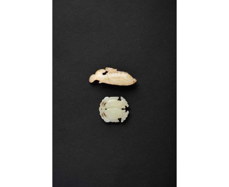 TWO CHINESE CELADON JADE 'FISH' PENDANTSQING DYNASTYOne carved as two fish pierced for suspension to a knotted ribbon above t