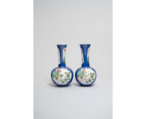 A PAIR OF CHINESE POWDER-BLUE GROUND BOTTLE VASESKANGXI 1662-1722Each with a globular body and a slightly flared neck, reserv