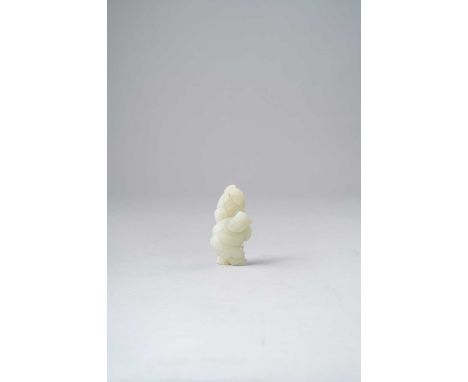 A CHINESE PALE CELADON JADE FIGURAL PENDANTQING DYNASTYDepicting a man in scholar's robes and a boy, possibly the Star god Fu