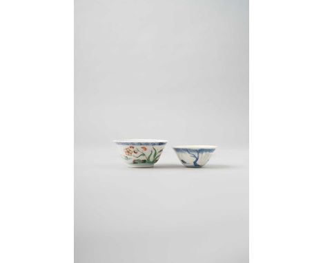 A CHINESE WUCAI 'CHICKEN' CUP AND A BLUE AND WHITE CUPKANGXI 1662-1722The former delicately painted with a hen, a cockerel an