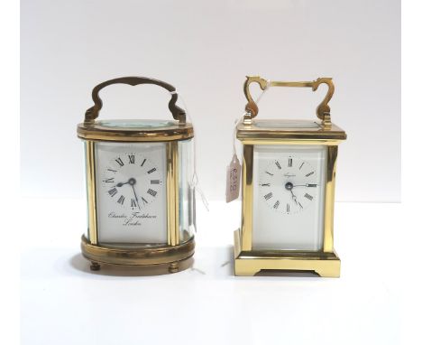 A Charles Frodsham oval carriage clock together with a Angelus carriage clock Condition Report:both wind and tick, no keys
