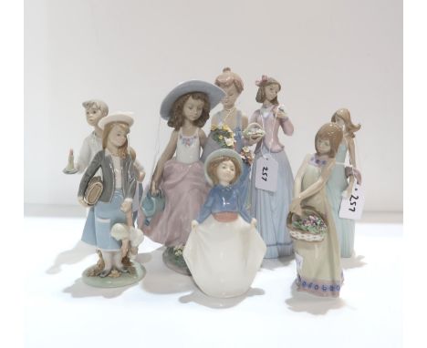 Seven Lladro figures on children and a Nao example Condition Report:Available upon request