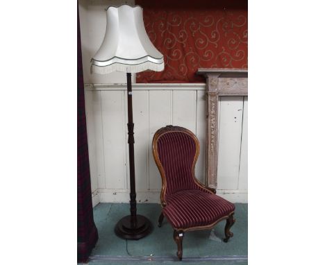 A Victorian walnut spoon back parlour chair with cabriole supports and a mahogany standard lamp (2) Condition Report:Availabl