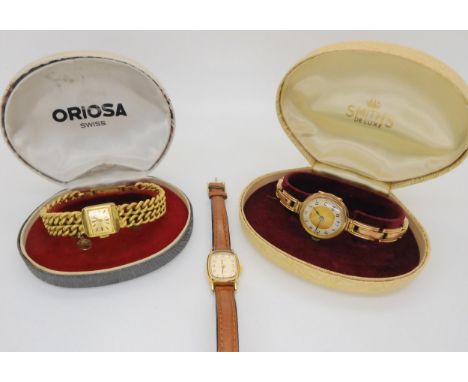 A 9ct gold ladies vintage watch and strap, diameter of trhe case 2.5cm, weight 24.87gms, a gold plated Oriosa watch in origin