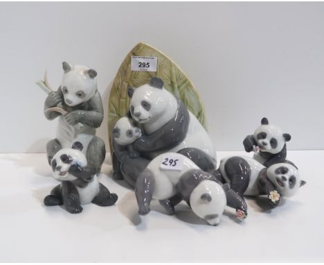 A collection of Lladro and Nao figures of pandas Condition Report:Available upon request