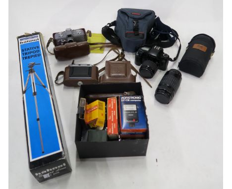 Assorted vintage and contemporary camera equipment, to include a Canon EOS 1000f camera with additional lens, a Zeiss Ikon Mo