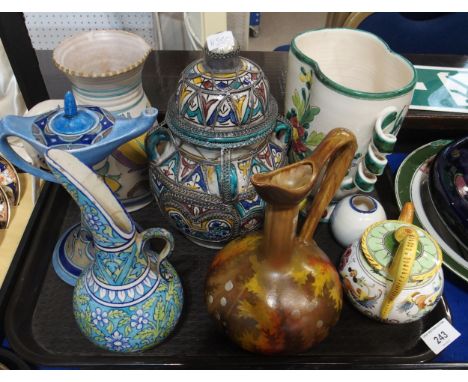 A collection of decorative ceramics including a Moroccan vase, Chameleon Ware genie lamp, Rubens Ware vase, Royal Stanley War