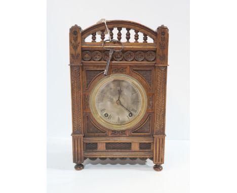 A 19th Century W&amp;H Sch carved oak mantle clock Condition Report:Available upon request