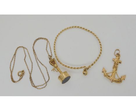 A 9ct gold lampost shaped fob seal with 48cm fancy chain, a 9ct gold anchor shaped pendant and a yellow metal twist pattern b