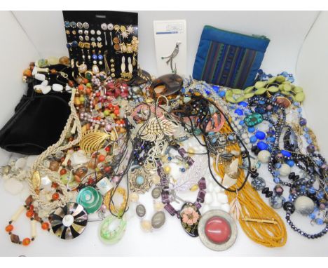 A large collection of vintage beads and costume jewellery Condition Report:Not available for this lot.