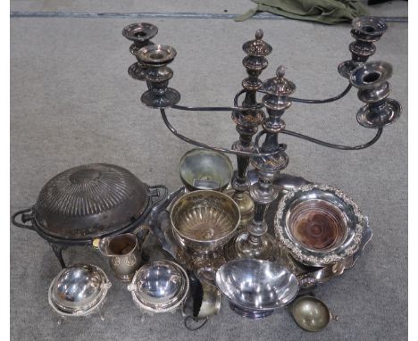 A large collection of EPNS including a rollover breakfast dish, two rollover butter dishes, wine coasters, chamberstick, engr