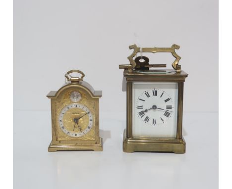 A French brass and glass carriage clock and another clock by Swiza Condition Report:Carriage clock winds and ticks