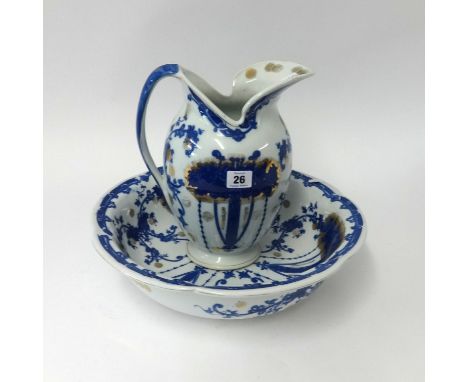 A reproduction Victorian style blue and gilt jug and basin.