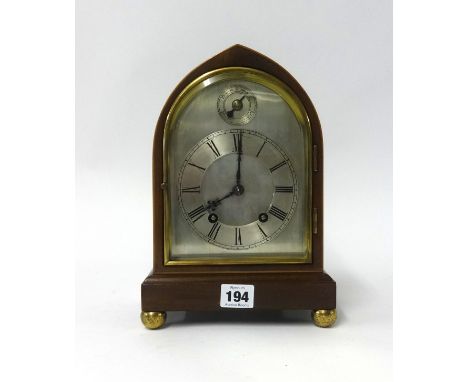 A mahogany cased bracket clock with double gong strike and eight day movement, height 27cm.