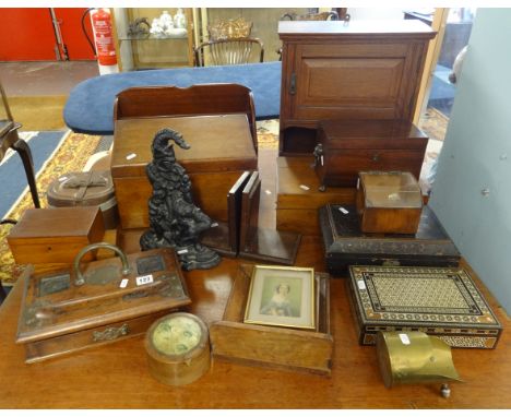 A collection of various boxes, pen and ink stand, trench art, book ends, punch door stop, tea caddy, letter racks etc (approx