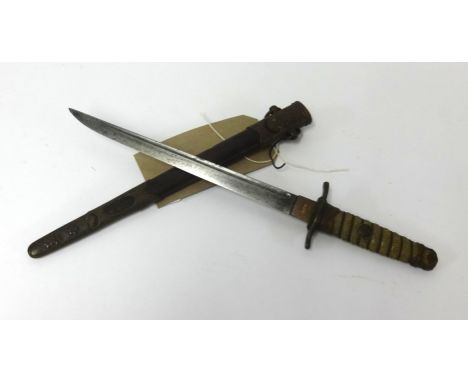 A Japanese Naval Dirk dagger with a shagreen type handle, steel blade, leather and metal mounted scabbard, length 32cm.