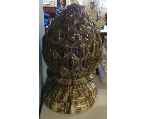 A large glazed ceramic finial in the form of an acorn, height 47cm.