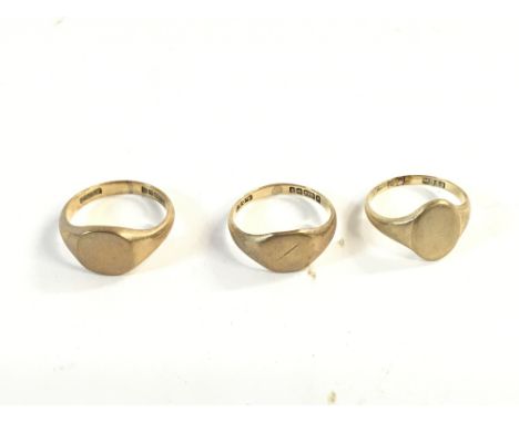 Three 9ct gold signet rings size L - K and I (left to right). Total weight 8.9gPostage A
