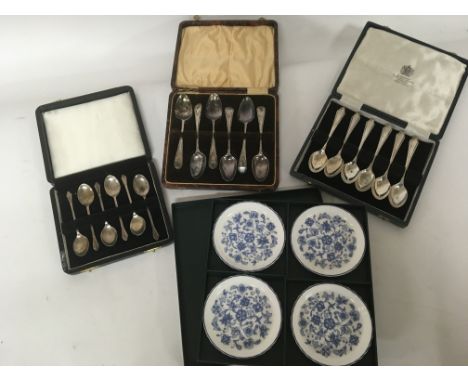 Two pairs of cased silver spoons and a set of blue and white Minton dishes one case of silver plated (amended description)