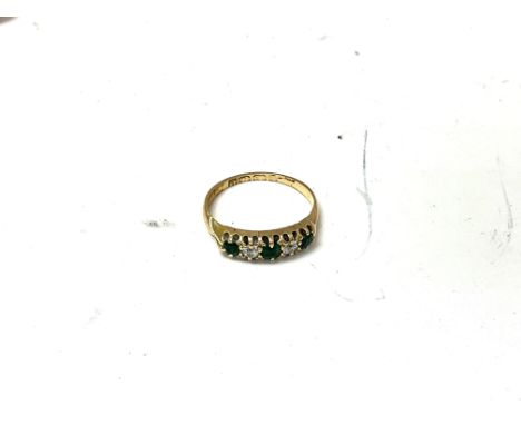 An 18ct gold emerald and diamond set ring. Ring size K, approx 2.42 grams.